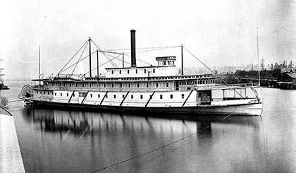 Sternwheelers wait to go through the Cascade Locks in the very early 1900s, shown in a hand-tinted picture postcard. These sternwheelers were built several decades too late to have been the one that rescued Nancy Boggs and her girls.