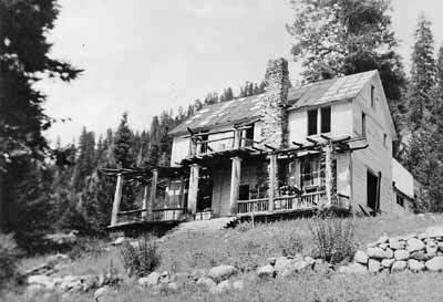 The rustic palace built by F. Wallace White in Bourne to impress visiting suckers, as seen in 1928 -- after a couple dozen years of neglect had worked it over.