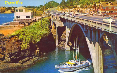 The short-but-gorgeous bridge across the channel at Depoe Bay. This bridge is like a hidden treasure; it looks utterly dull and pedestrian from up on its deck; you have to step off and look at it to appreciate it. The short-but-gorgeous bridge across the channel at Depoe Bay. This bridge is like a hidden treasure; it looks utterly dull and pedestrian from up on its deck; you have to step off and look at it to appreciate it.
